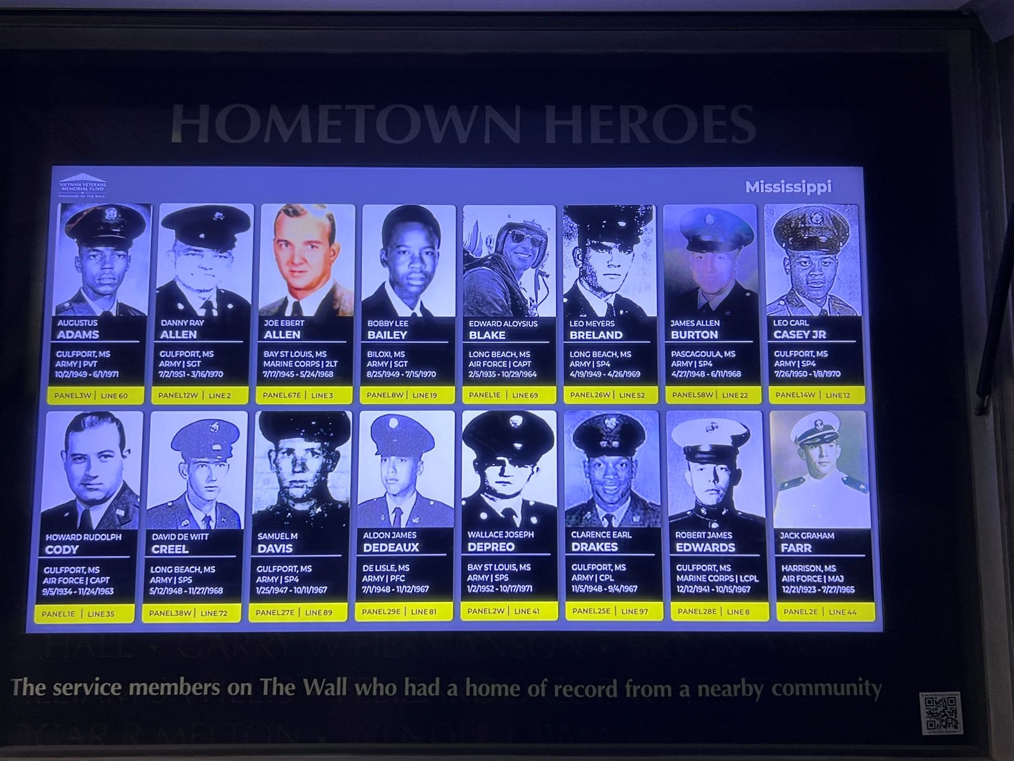 The Hometown Heroes digital display showing photographs of local service members on The Wall